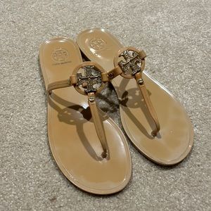 Nude Tory Burch flip flops